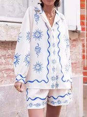 Blue and white sun print pajama set with snake accents by Daverri Fashions