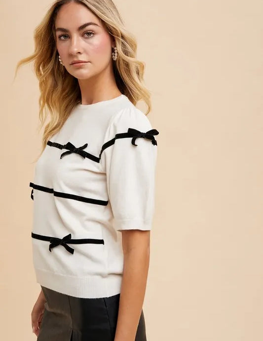 Annie Wear Striped Bow Round Neck Knit Top | Tops Daverri Fashions