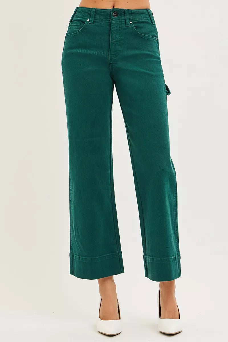 RISEN emerald green wide-leg cargo pants with rolled cuffs, back view