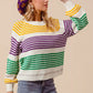 Vibrant SO ME Mardi Gras knitted raglan sweater with bold purple, yellow, green, white stripes