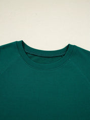 Green crew neck t-shirt in round neck top and stripe pants set