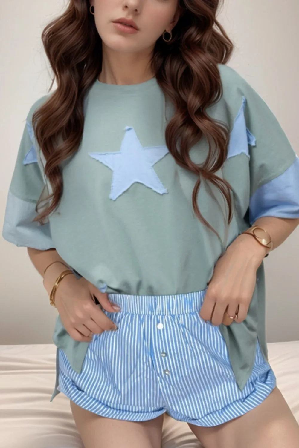 Light blue star-patterned oversized frayed denim t-shirt