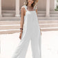 White sleeveless wide-leg jumpsuit with tie shoulders