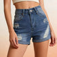 Daverri Distressed High-Waisted Denim Shorts with frayed patches and rolled cuffs