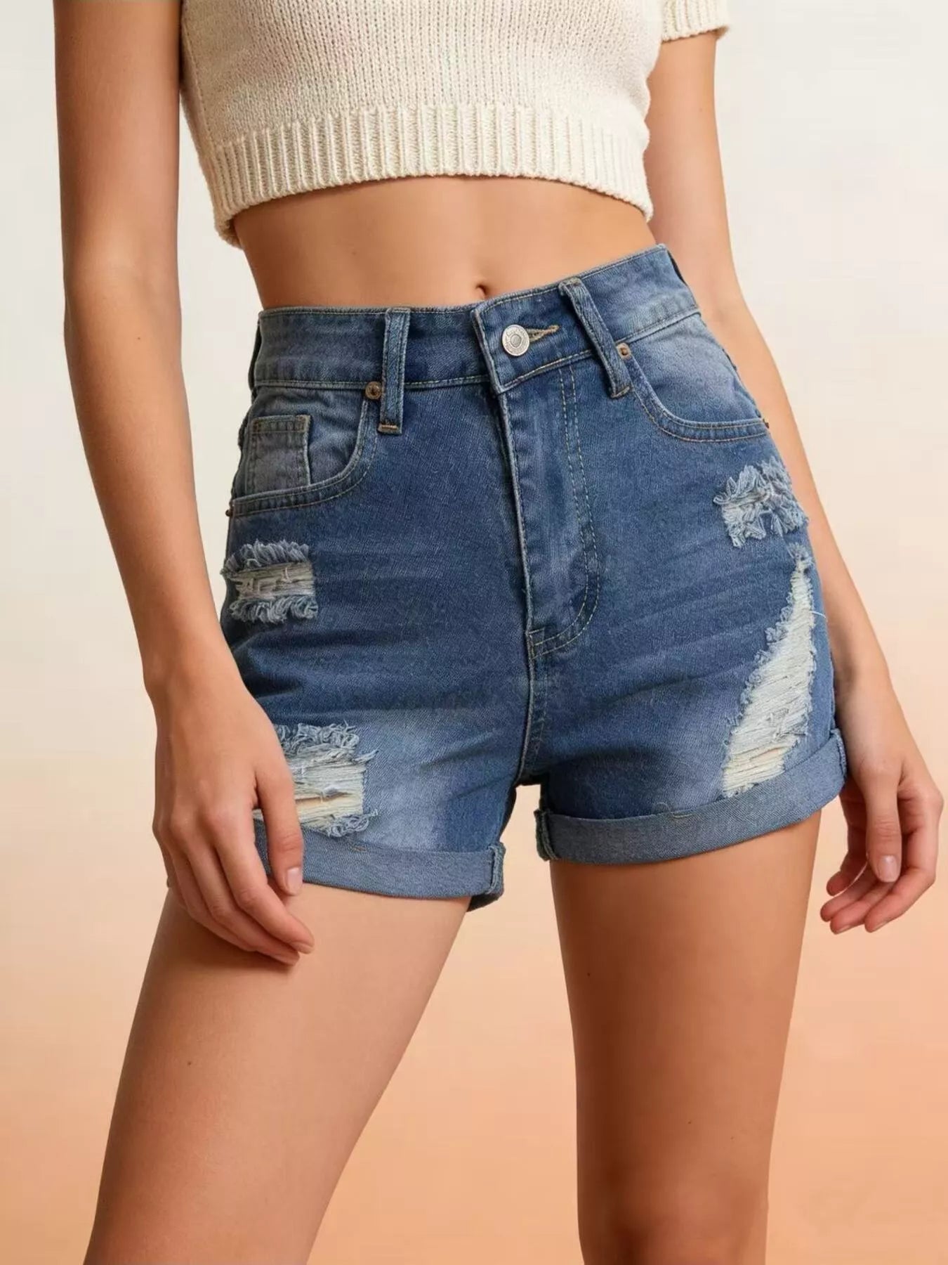 Daverri Distressed High-Waisted Denim Shorts with frayed patches and rolled cuffs