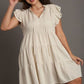 Cream ruffled tiered linen A-line mini dress with gold buttons and straw hat