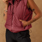 Maroon drawstring zip-up hooded puffer vest with pockets