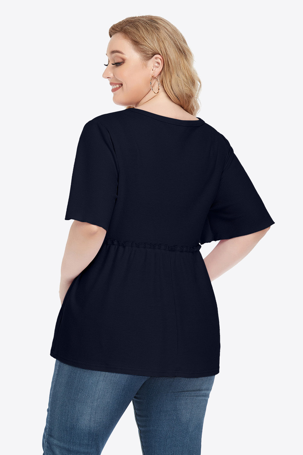 Navy blue plus size V-neck peplum blouse with short sleeves and pockets
