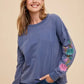 Annie Wear Embroidered Long Sleeve French Terry Top Washed Midnight - DAVERRI FASHIONS