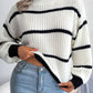 Cozy black and white striped plus size mock neck knit sweater