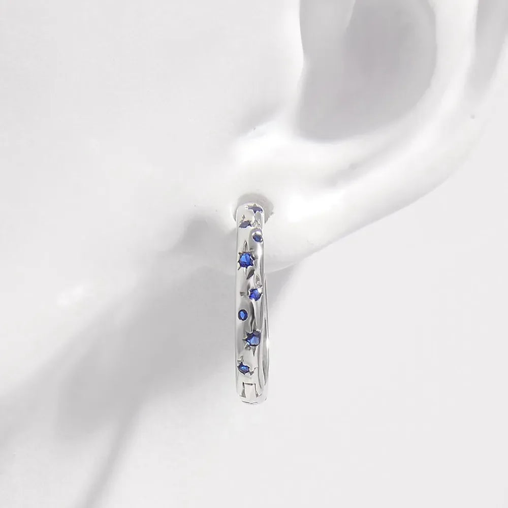 925 sterling silver huggie earrings with blue zircon gemstones
