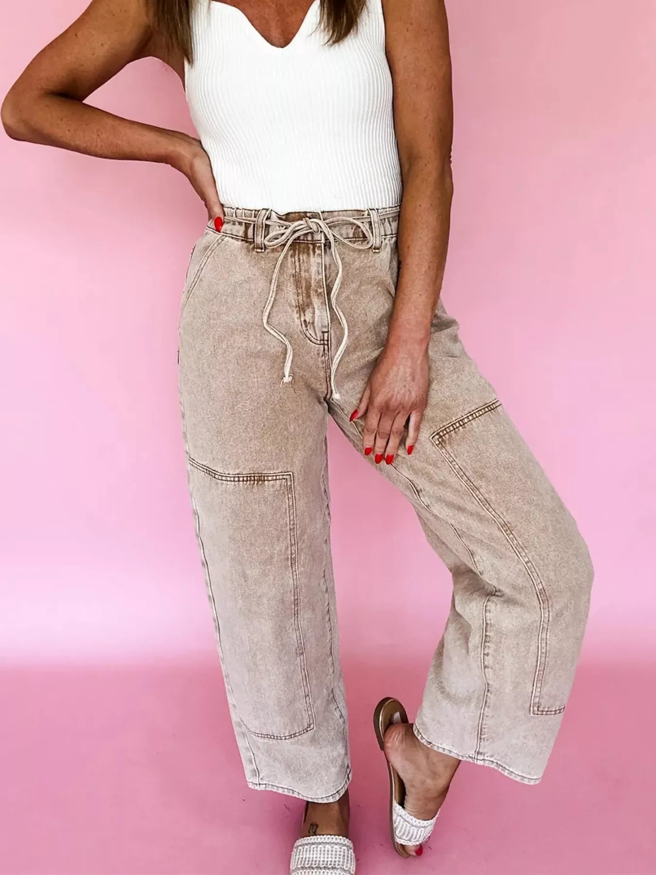 Acid wash wide leg jeans in beige with drawstring waist and patch pockets