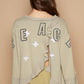 POL Peace Embroidered Exposed Seam Back Ruffle V-Neck Top Tops