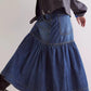 Daverri midi denim skirt in mid-blue with tiered flared silhouette and pockets