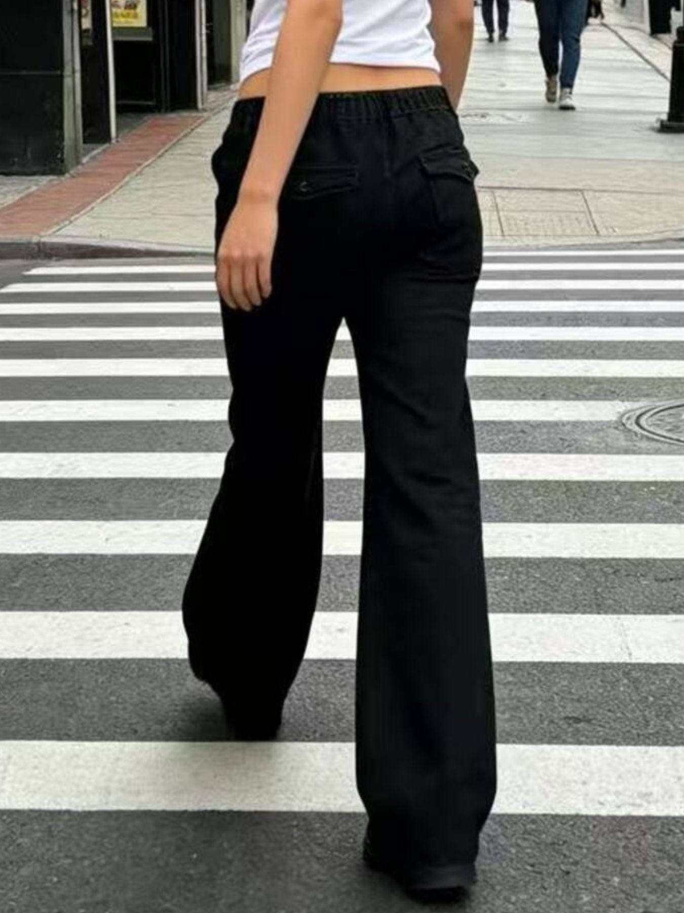 Black wide-leg cargo pants with elastic waistband and pockets