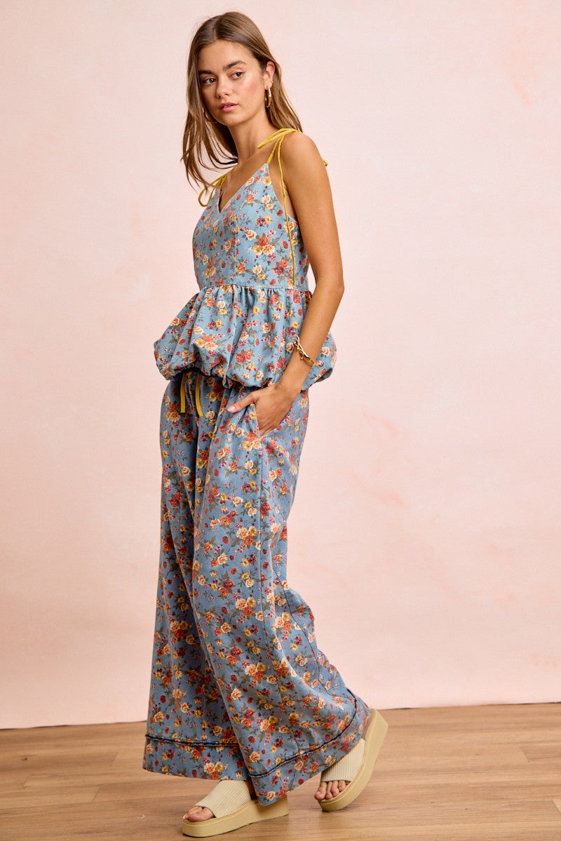 Woman in BiBi floral printed drawstring wide-leg pants jumpsuit