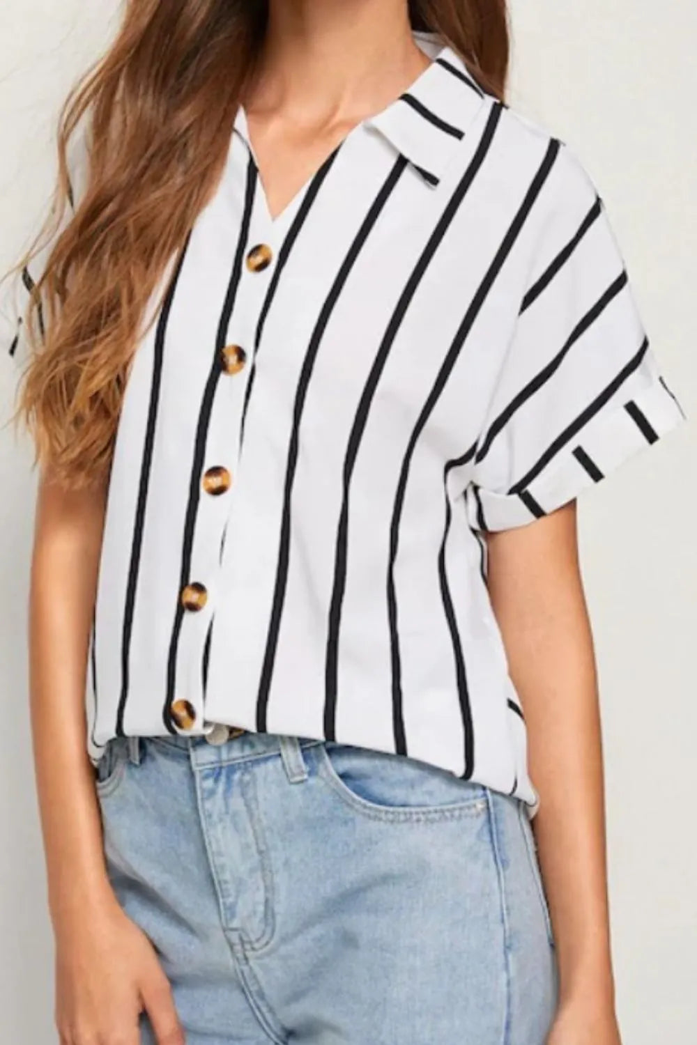 White and black striped short-sleeve button-up shirt with gold buttons