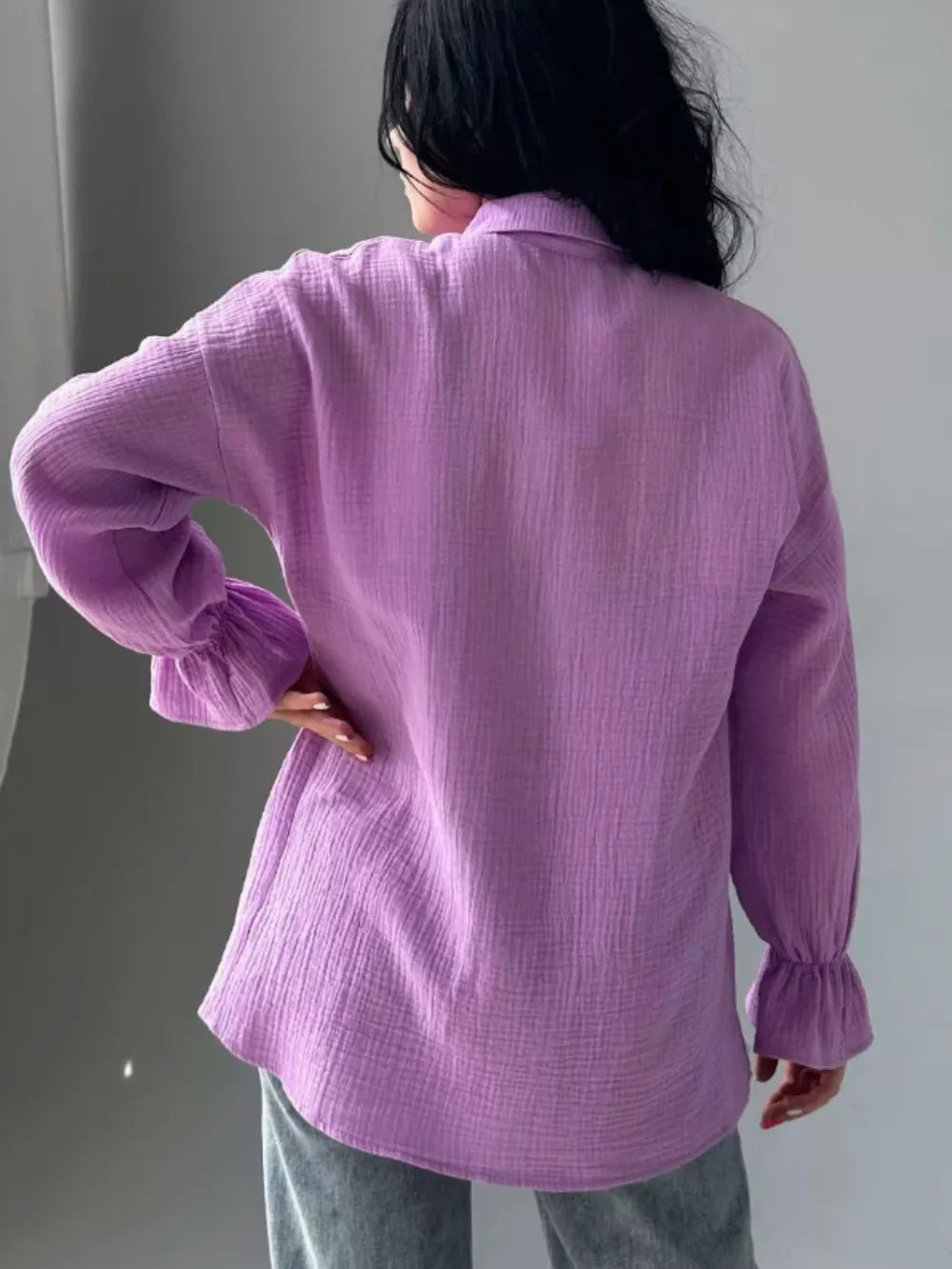 Soft lavender textured cotton blouse with ruffled cuffs and relaxed fit