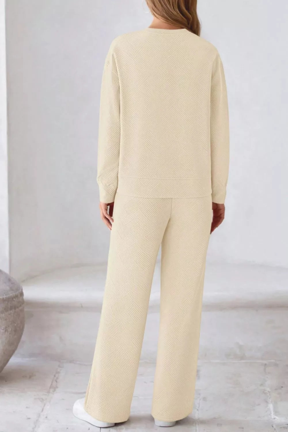 Cream-colored ribbed knit womens sweatsuit set with relaxed fit