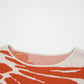 Boho flower pattern oversized knit sweater in orange white abstract design