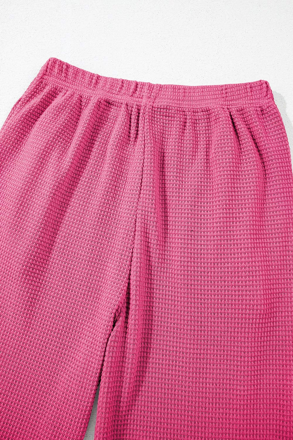Bright pink waffle-knit pajama pants in casual set