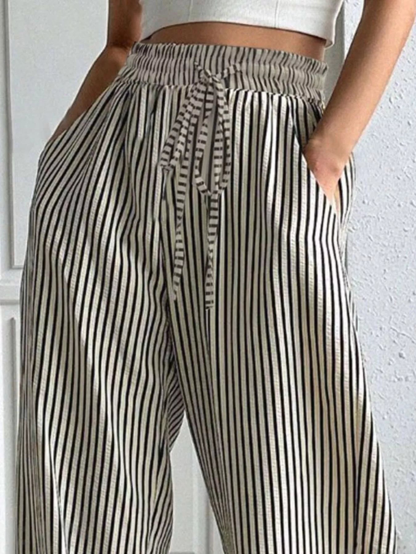 Daverri striped high-waisted wide-leg pants, black and cream vertical stripes