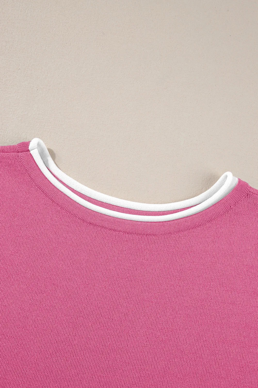 Pink crew neck sweater with white trim in top and pants set