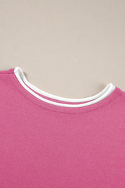 Pink crew neck sweater with white trim in top and pants set