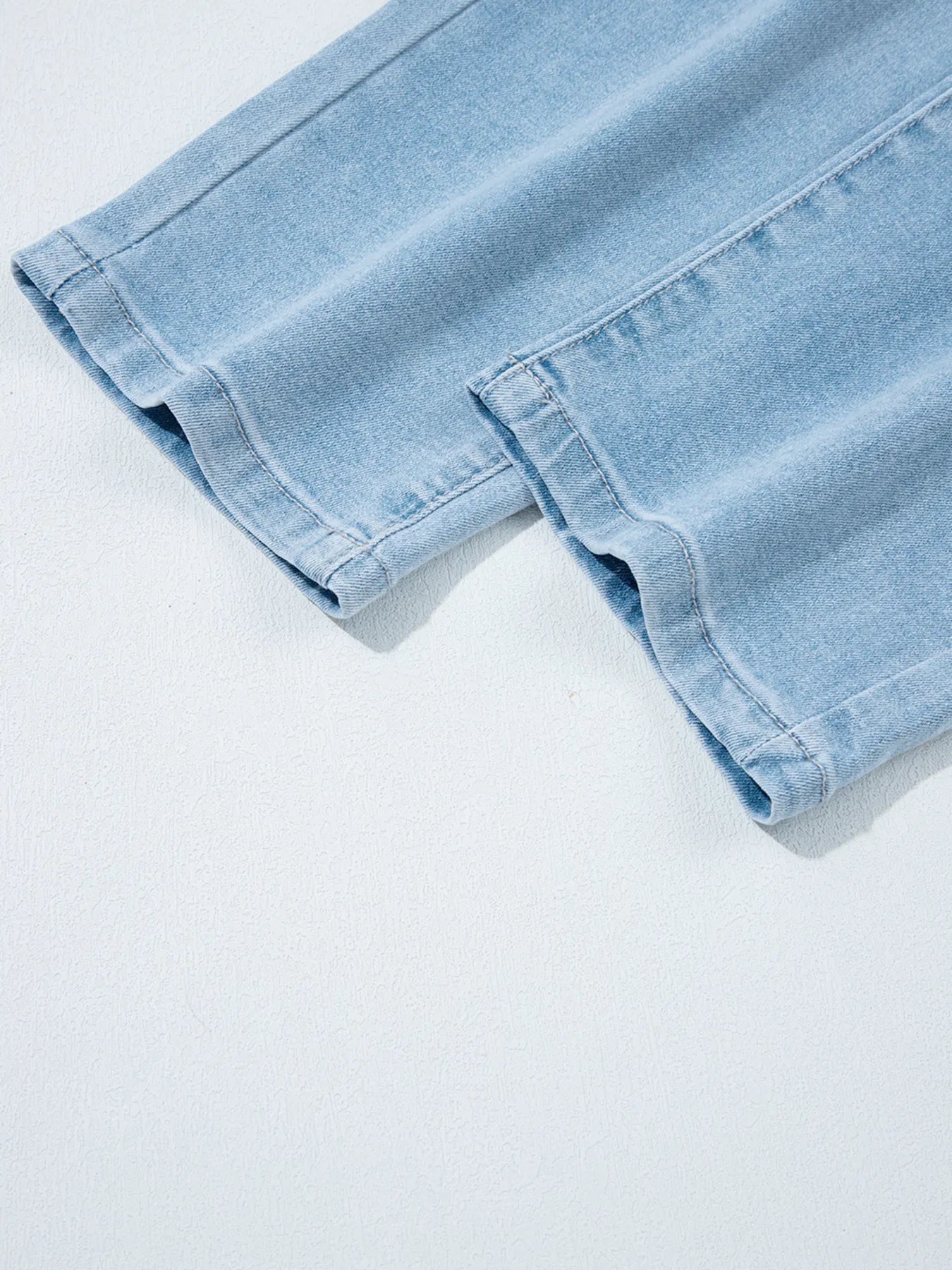 Light blue high-rise barrel relaxed denim shorts with patch pockets