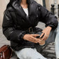 Black glossy Daverri belted puffer jacket with elastic cuffs