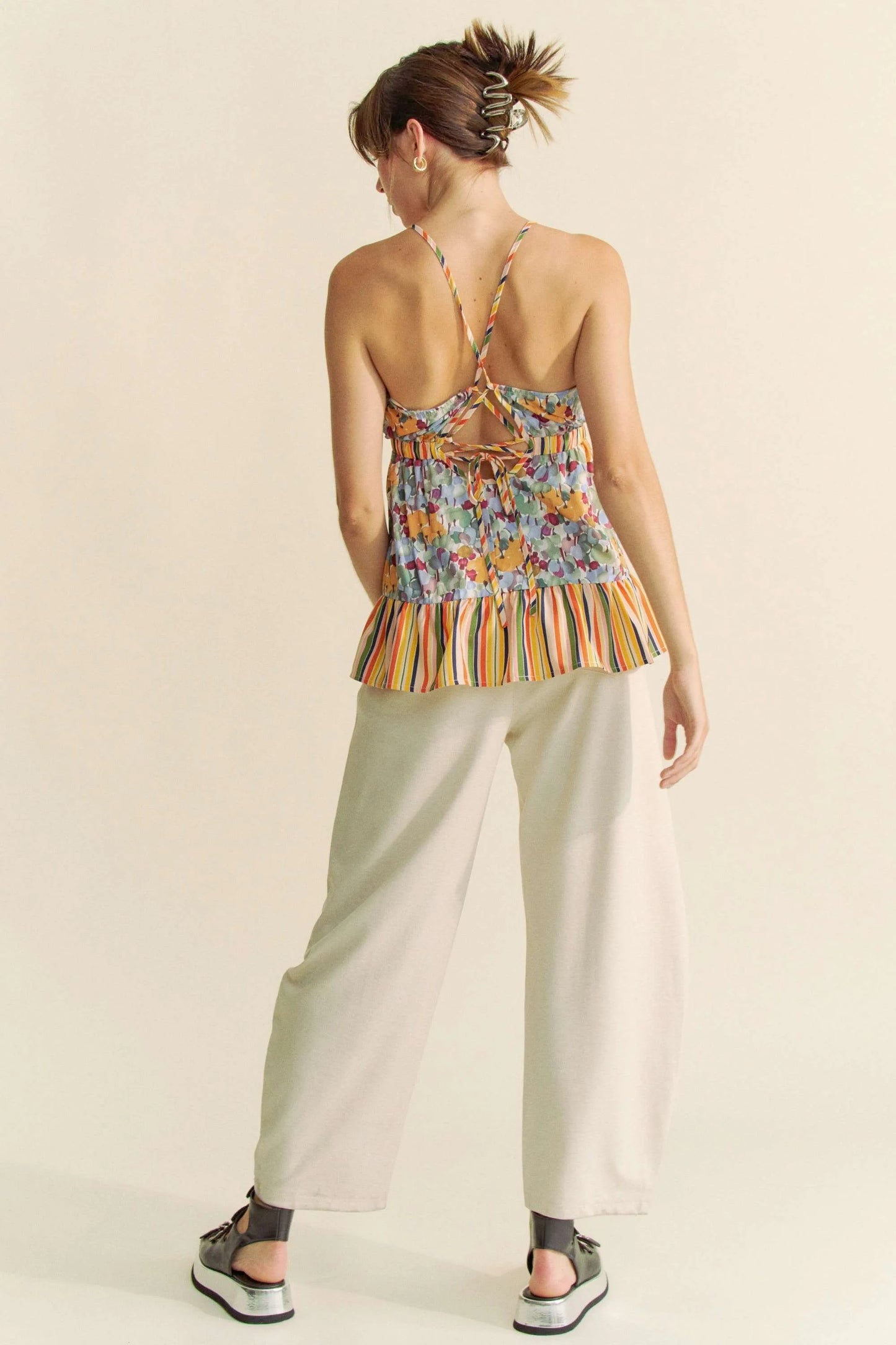 Davi & Dani floral smocked halter top with ruffled striped hem