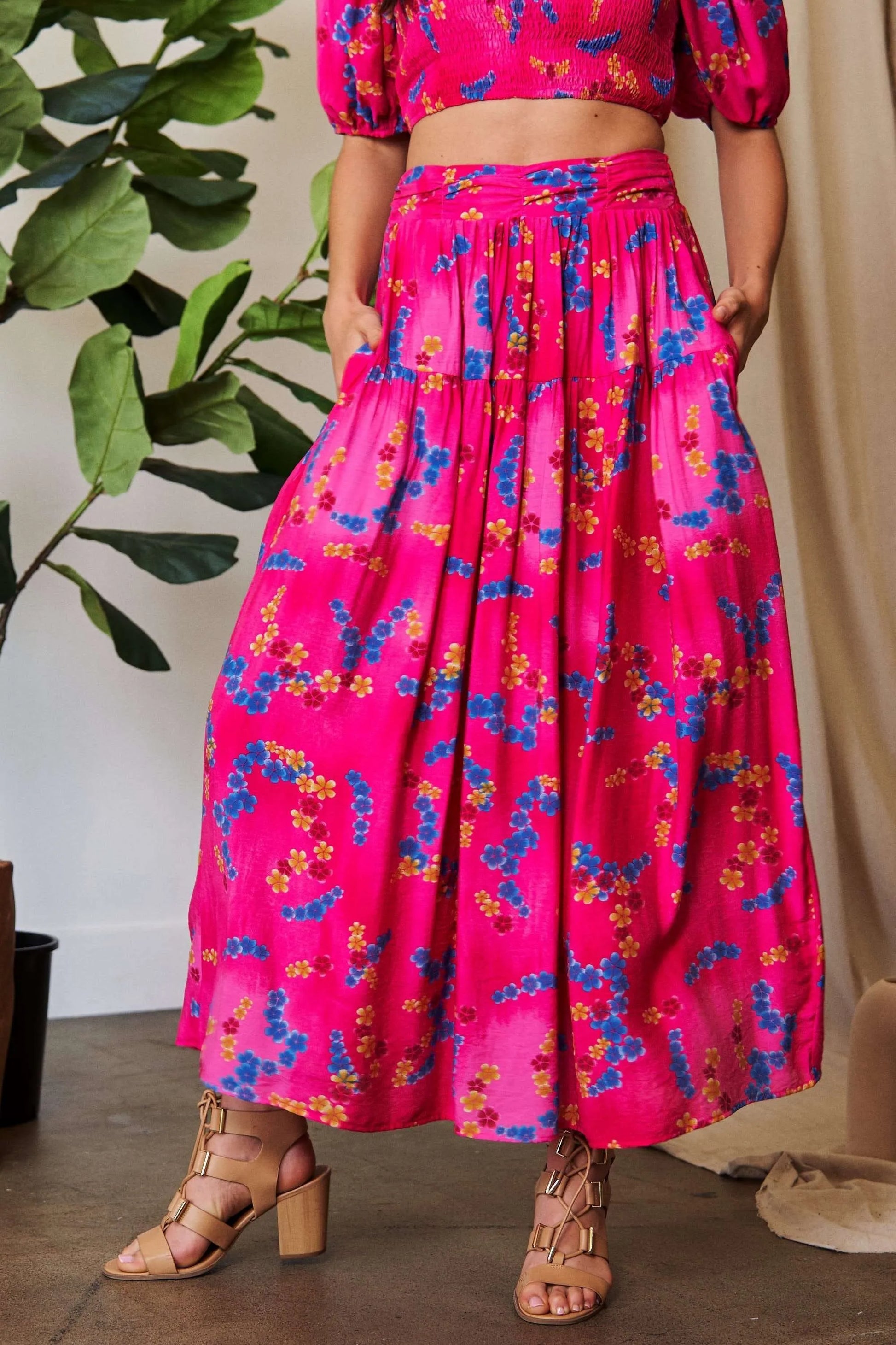Vibrant pink Davi & Dani printed smocking waistband ruffled maxi skirt with floral accents
