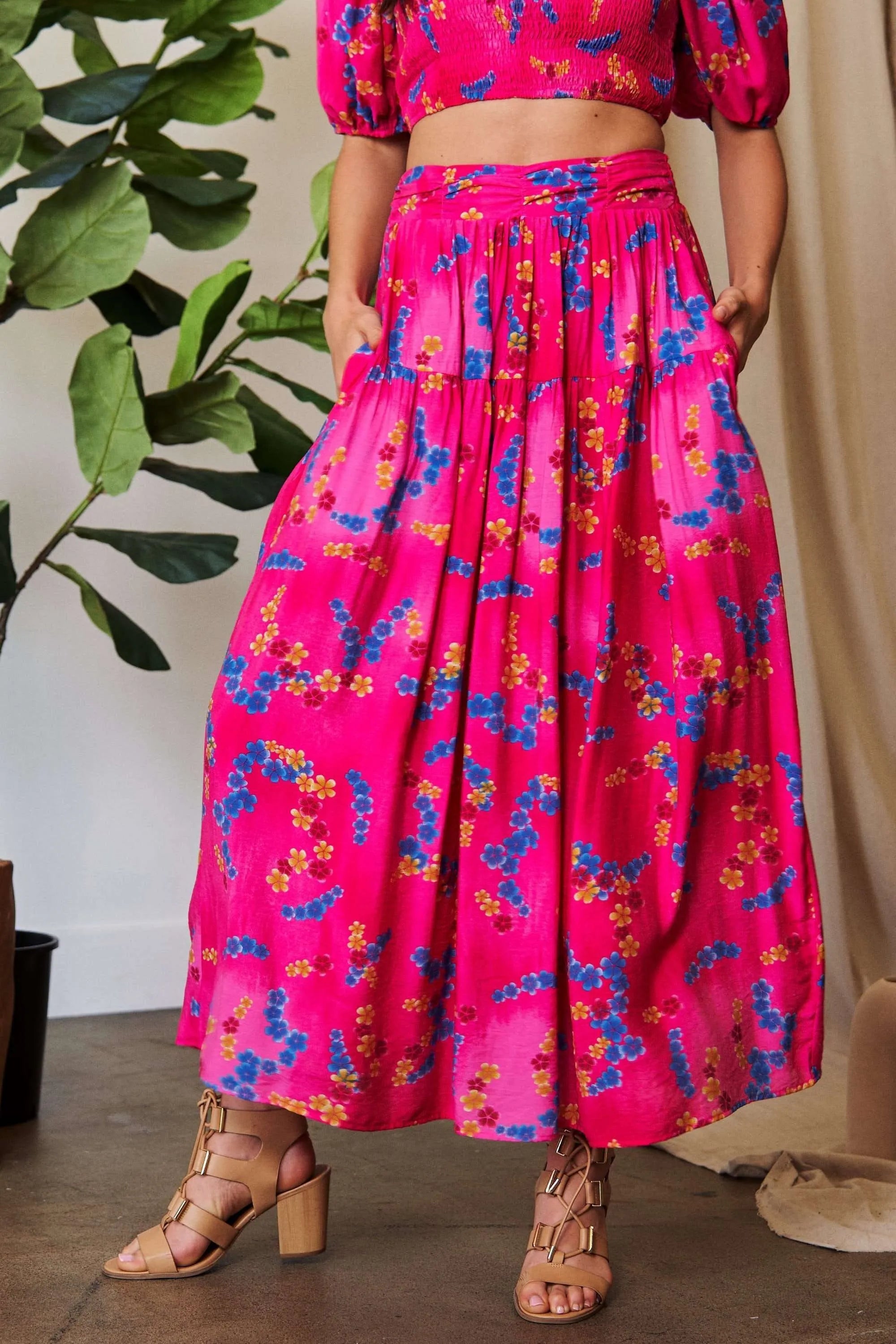 Vibrant pink Davi & Dani printed smocking waistband ruffled maxi skirt with floral accents