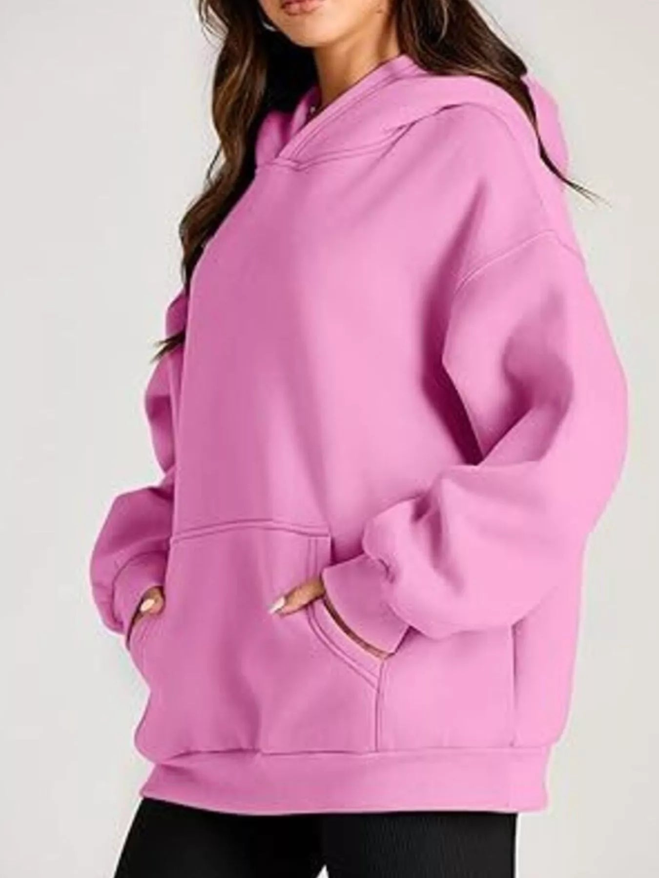 Oversized pink kangaroo pocket long sleeve hoodie with relaxed fit
