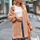 Tan oversized waffle-knit cardigan with ribbed texture and open front