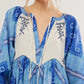 Blue and white printed tie neck boho mini dress with flowing sleeves