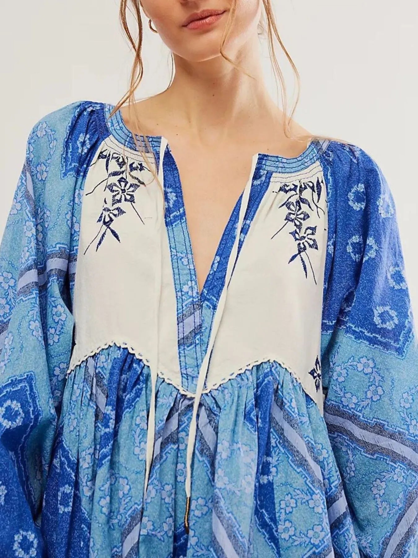 Blue and white printed tie neck boho mini dress with flowing sleeves
