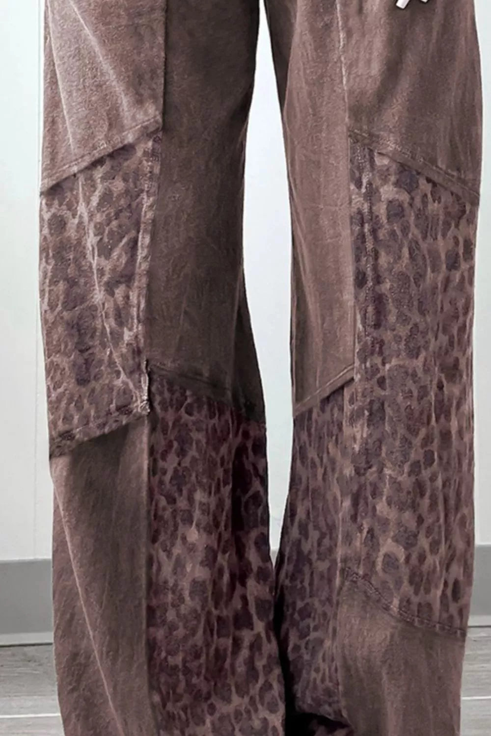 Leopard wide leg pants in brown print with distressed patchwork texture