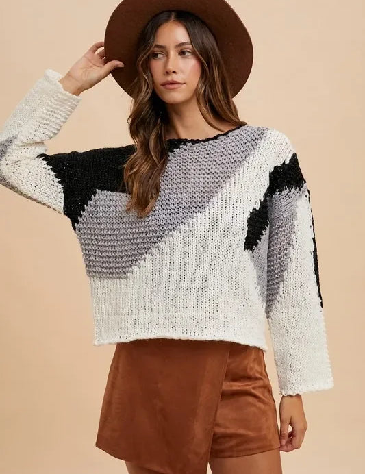 White and black geometric Annie Wear drop shoulder sweater with bell sleeves