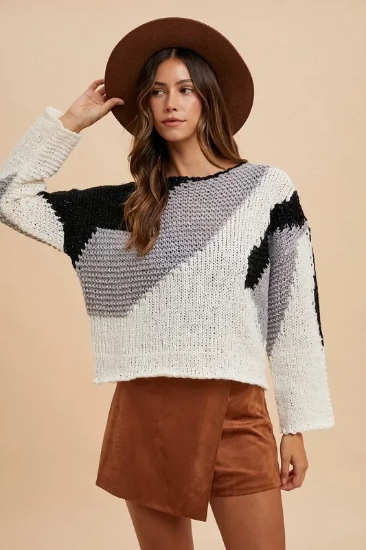 White and black geometric Annie Wear drop shoulder sweater with bell sleeves