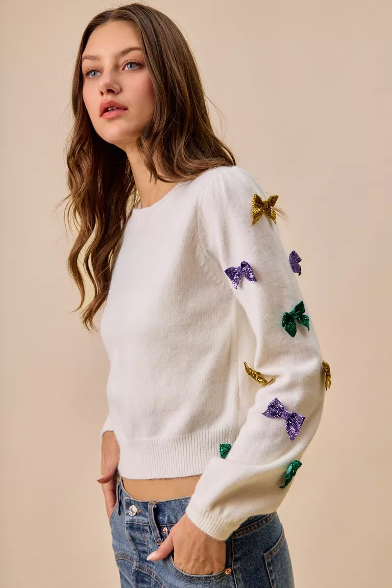 White SO ME Mardi Gras glitter bow knit sweater with colorful sequins