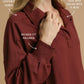 Umgee Exposed Seam Long Sleeve Polo Top with Side Slit Tops