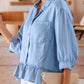 Daverri light blue chambray ruffled blouse with puffed sleeves