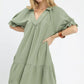 Sage-colored Umgee Tiered Puff Sleeve Babydoll Dress in lightweight cotton