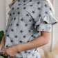 Gray star-patterned crew neck T-shirt with tiered ruffled sleeves