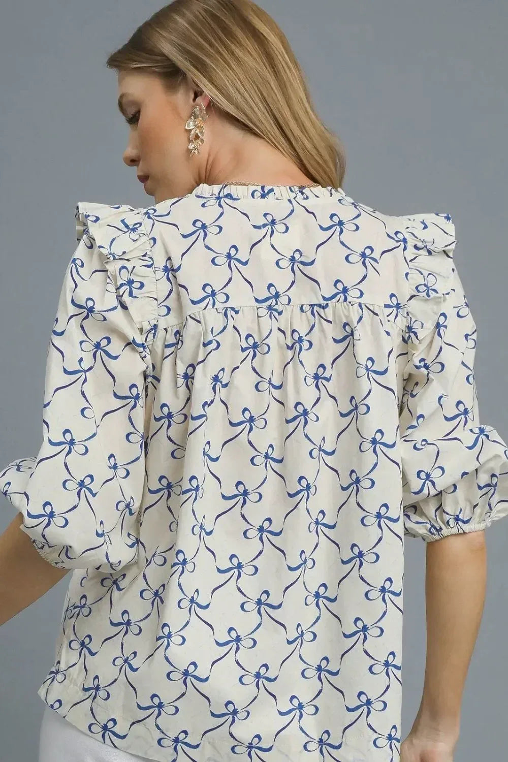 Umgee Ruffled Bow Print Notched Blouse - DAVERRI FASHIONS
