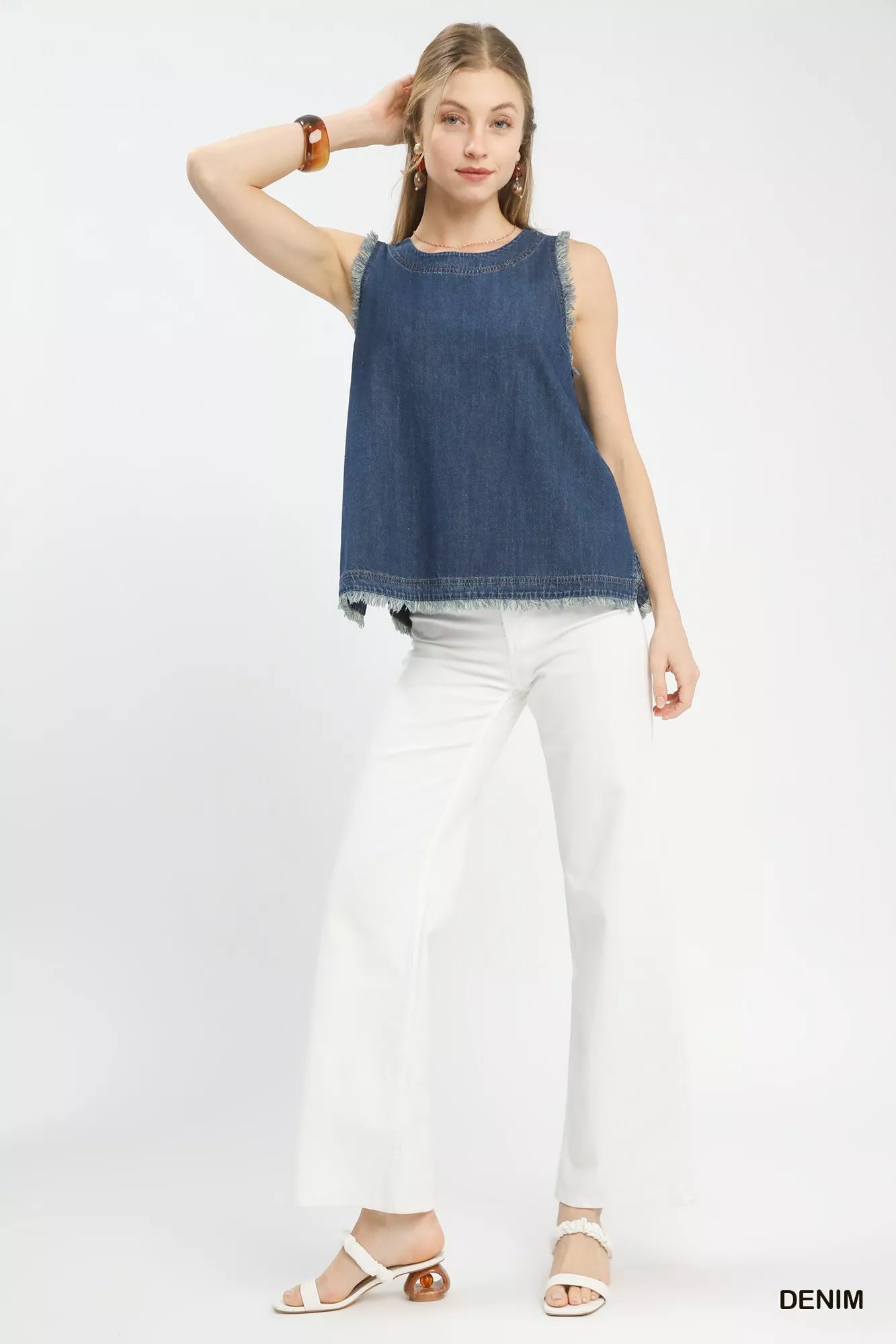 Umgee Sleeveless Fringe Hem Denim Top in blue wash with frayed edges