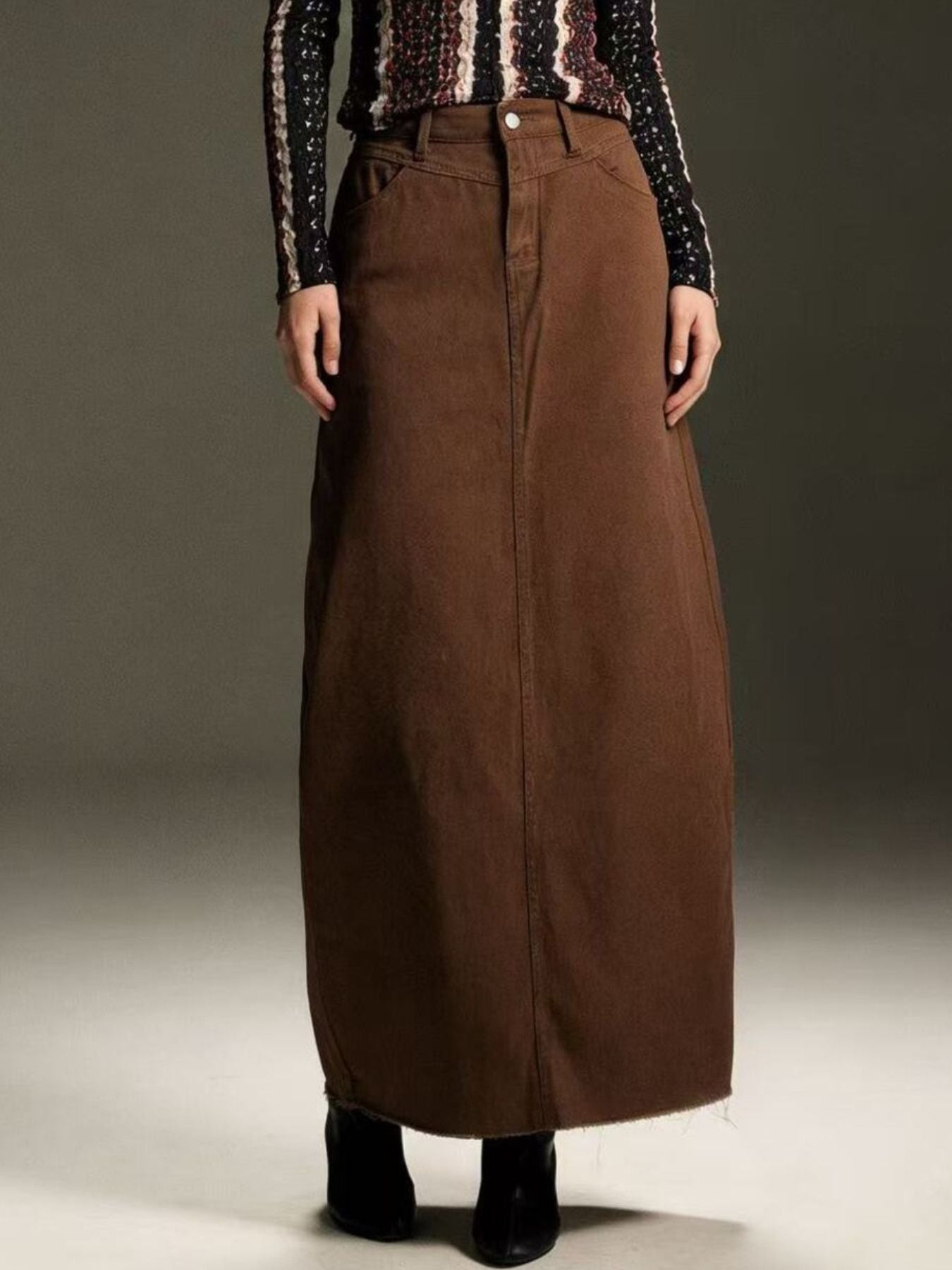 Raw hem maxi denim skirt with long straight cut, button front and stitching