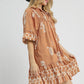 Umgee Boarder Print Tassel Tie Neck Mini Dress Mini Dresses