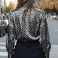 Sleek leopard button-up long sleeve shirt in silver and black print